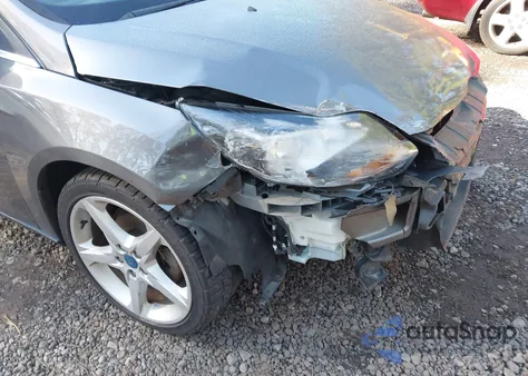 2012 Ford Focus Titanium z USA, uszkodzony, nr VIN 1FAHP3N22CL213454